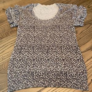 Lightweight silk/cashmere animal print sweater w unique double ruffle sleeves.